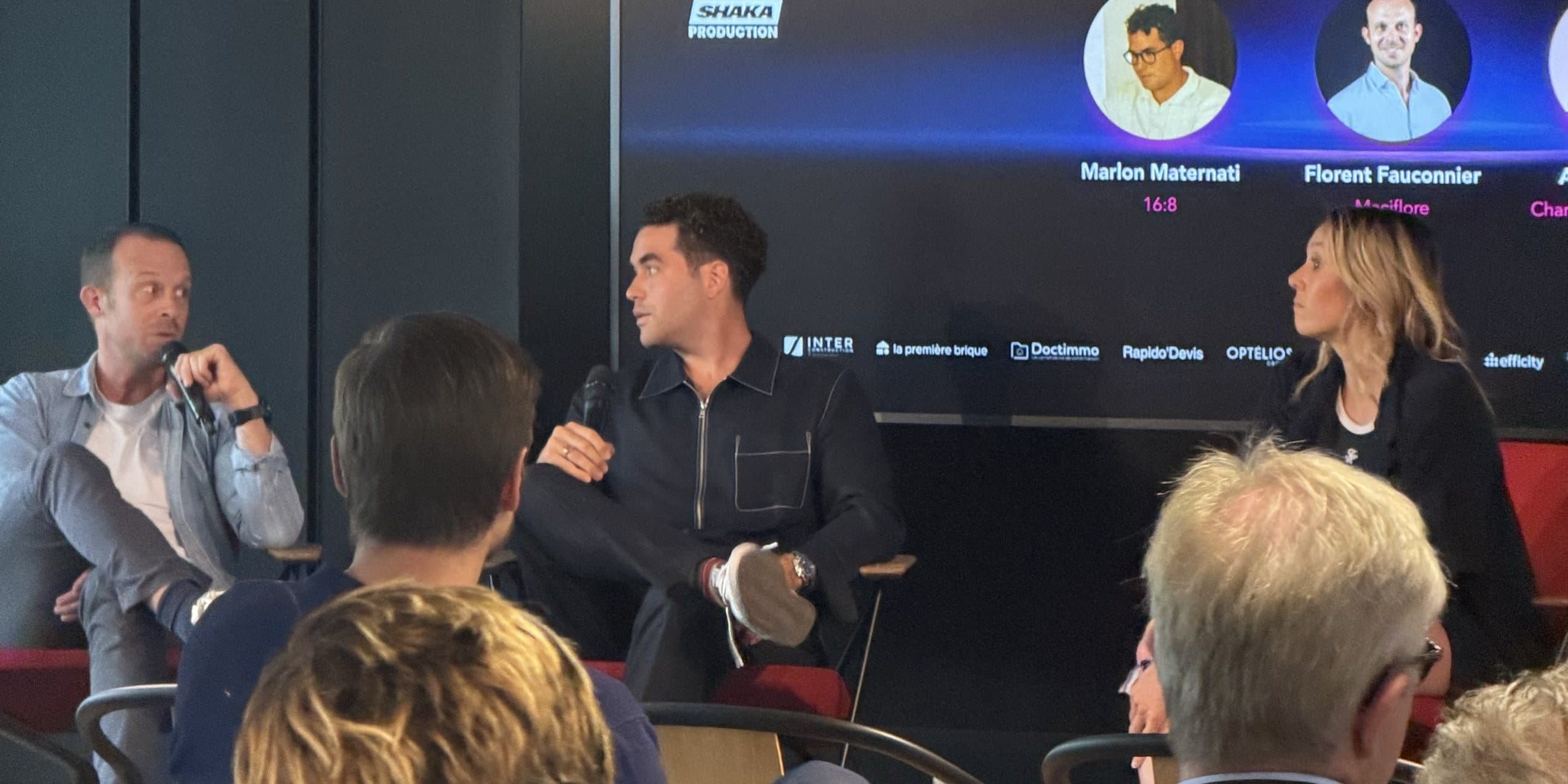 The panel at Paris Opportunity Week, Marlon's name on the screen
